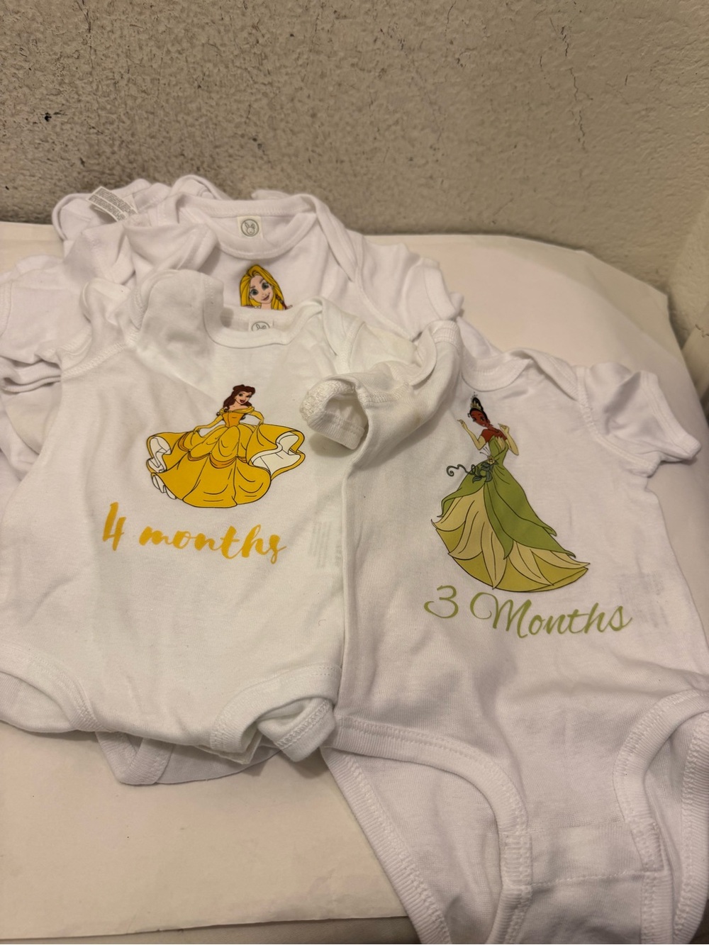 Bundle of 5 White Disney Princess Milestone One-Piece Bodysuits - 6 Months